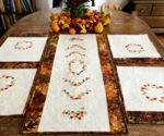 Autumn-themed quilted tablerunner and placemats