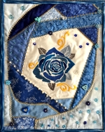 Azure Rose Crazy Quilt with blue rose embroidery