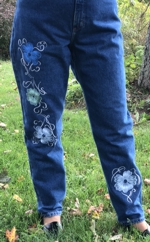 Jeans embellished with flower embroidery
