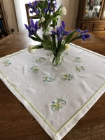 Spring-Themed Linen Table Topper with machine embroidery