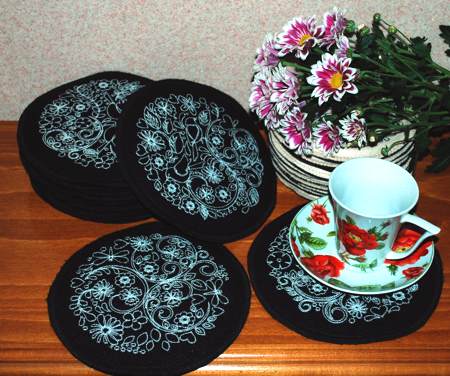 Advanced Embroidery Designs - Redwork Flower Coaster Set.