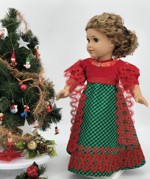 18-inch doll in a red-and-green Regency style dress with embroidery.