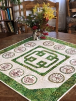 Quilted Tabletopper with fall trees in Celtic style.