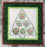 Christmas Tree wall quilt with embroidery.