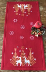 Red canvas tablerunner with gold-and-white Christmas-themed embroidery.