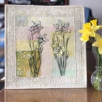 Wall quilt with daffodil embroidery