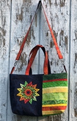 Shoulder bag with fall leaves mandala on the front panel.