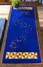 Royal Blue tablerunner with fall trees and leaves embroidery.