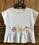 Kid's Tshirt decorated with mushroom applique machine embroidery.
