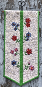 Wall hanging with flower embroidery