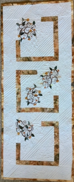 Spring vines tablerunner, work of the customer.