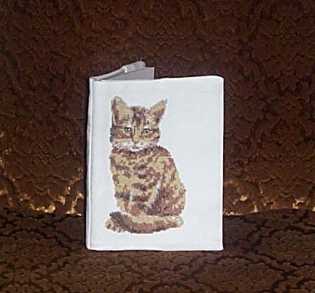 Cat Notebook and Framed Impressionist Works image 1