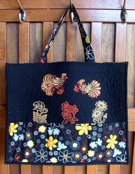 Quilted Tote Bag with Outer Pockets and Embroidered Panels image 1