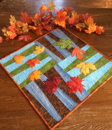 Dancing Leaves Quilted Table Topper image 1