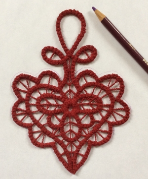 Pincushion with lace stitch-out image 2