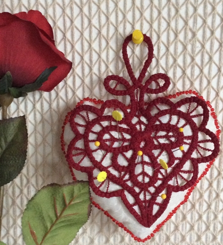 Pincushion with lace stitch-out image 1