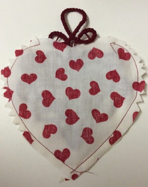 Pincushion with lace stitch-out image 10