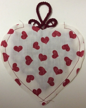 Pincushion with lace stitch-out image 9