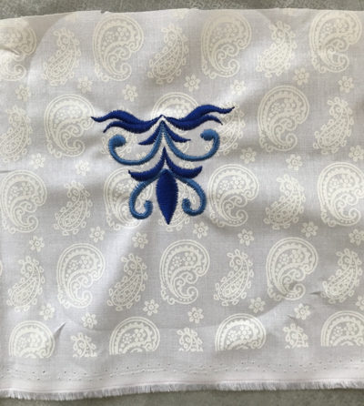 Photo of a piece of fabric with embroidery.