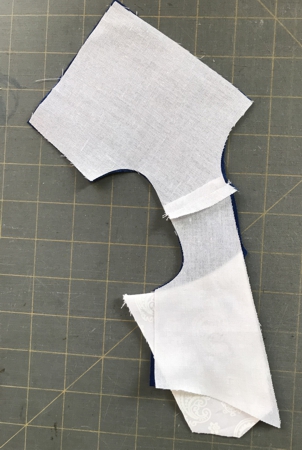 Photo demonstrating how to position the lining, stomacher and bodice in order to attach them together
