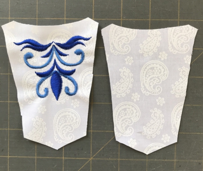 Photo of the cut-out pieces of the stomacher