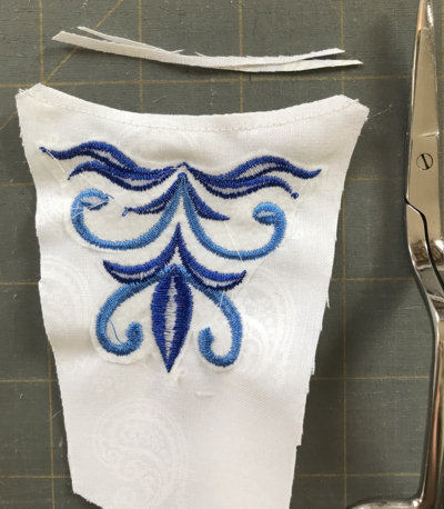 Photo of a stomacher demonstrating how to trim the seam