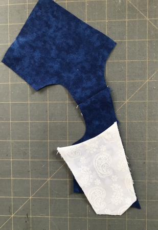 Photo showing how to position the stimacher over the bodice for further sewing them together