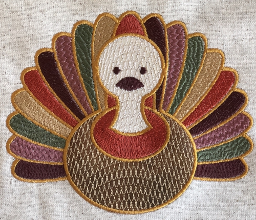 The photo of the finished machine embroidered turkey applique.