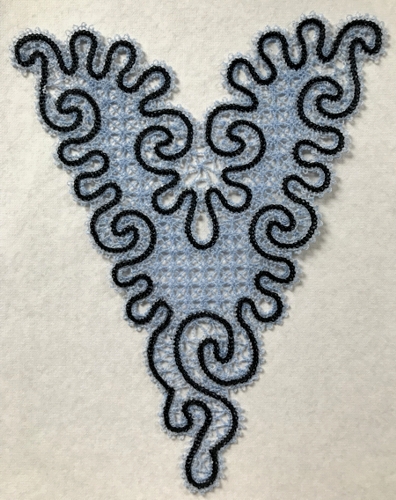 Photo of the stitch-out of the machine embroidered freestanding Battenberg Lace Insert or doily