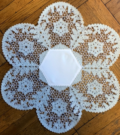 Photo of the finished doily with fabric insert
