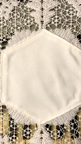 Photo showing the attached fabric center to the lace from the back side