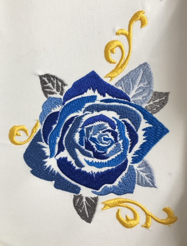 Stitch-out of the blue rose design.