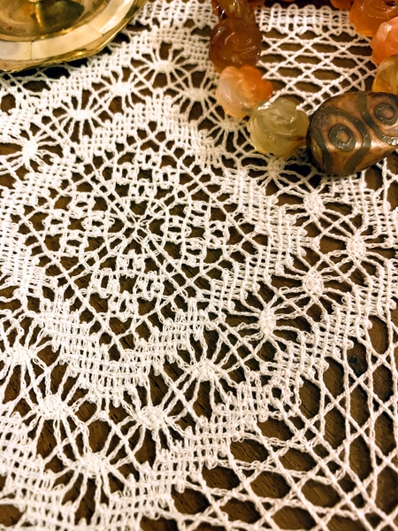 Photo of a finished doily. Close-up.