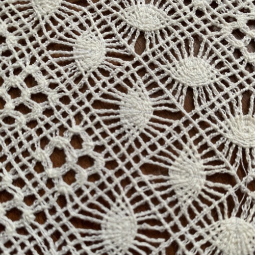 Photo of a finished doily. Close-up.