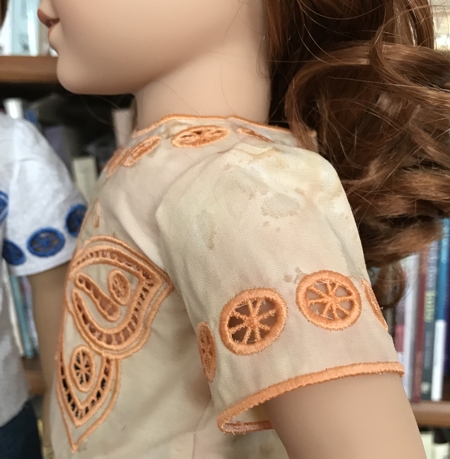 Photo showing the sleeve of the blouse on a doll