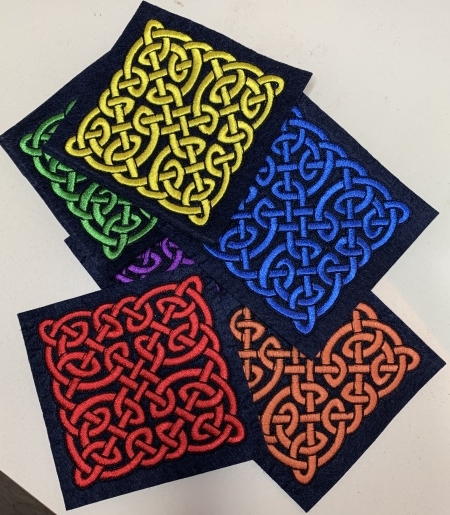 Squares with embroidered Celtic Motifs.