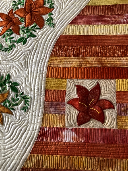 Finished Table runner with daylily embroidery. Close-up.