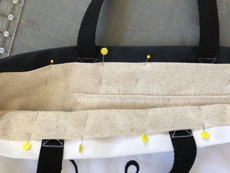 Insert the lining into the tote. Pin.