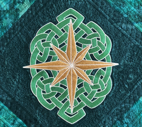 Stitch-out of the central Celtic star. Close-up.