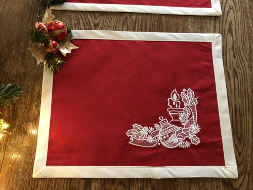 Finished placemats - red fabric and white embroidery