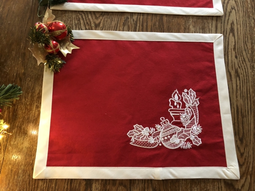 Finished placemats - red fabric and white embroidery