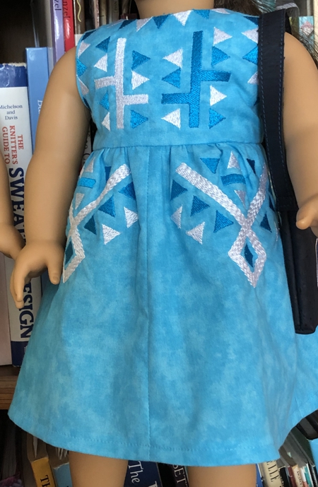 Close-up of the blue dress.