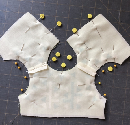 Lining pinned to the bodice. Wrong side.