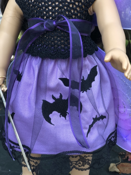 Close-up of the skirt on a doll.