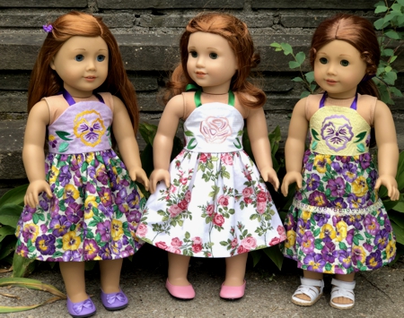 Doll sundress with pansy and rose embroidery.