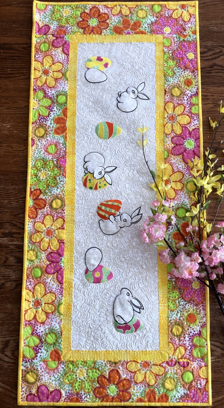 Finished tablerunner with Easter bunny embroidery.