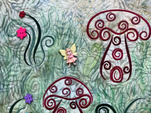 Close-up of the quilt's embellishments.