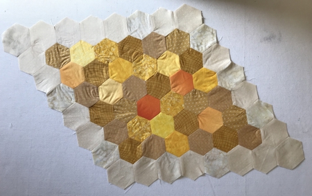 Hexagon shapes sewn together.