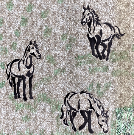 Embroidery of 3 horses.