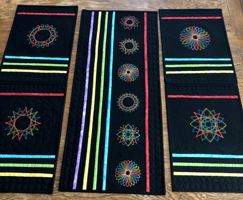 Finished Tablerunner and 4 placemats with geometric embroidery